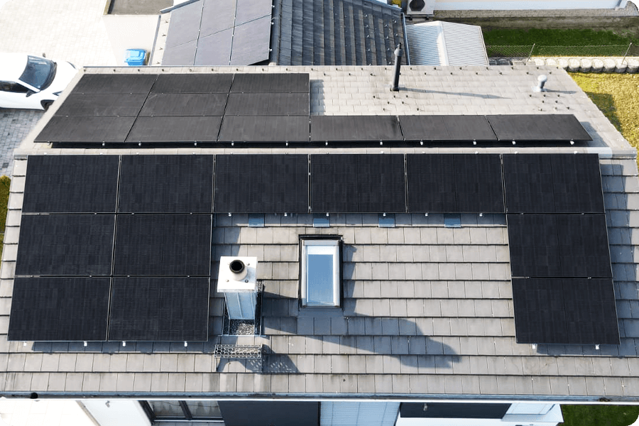 Horizontal installation on a European residential rooftop, suitable for low-pitch roofs with high-efficiency PV layout.