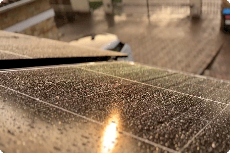Water droplets on a solar panel surface, illustrating potential moisture ingress when sealing materials or the backsheet are degraded.