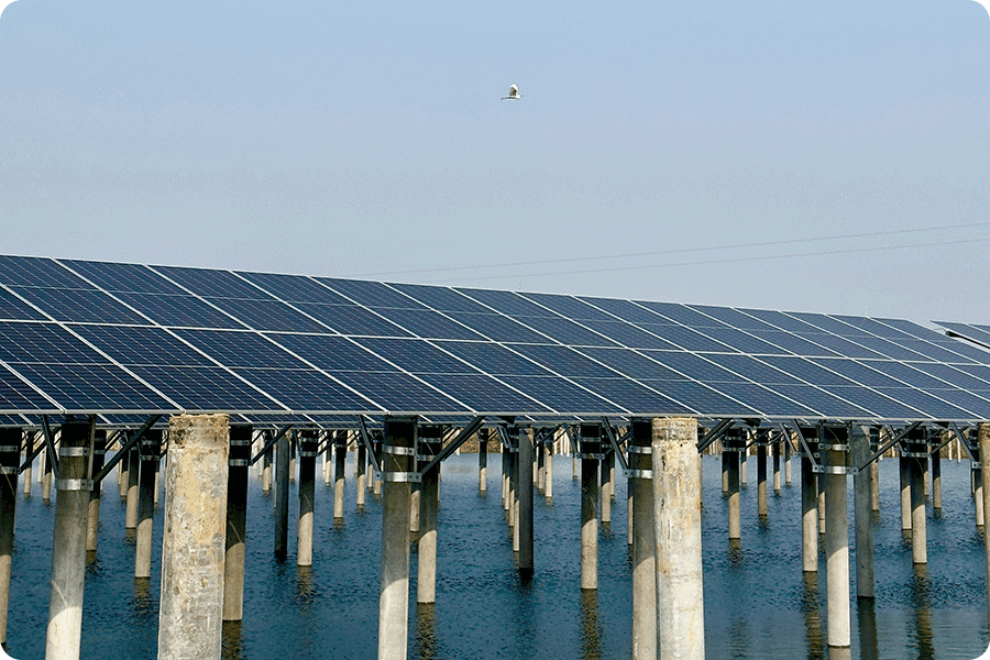Double-glass solar panel system in a high-humidity and salt mist environment, illustrating long-term structural compatibility.