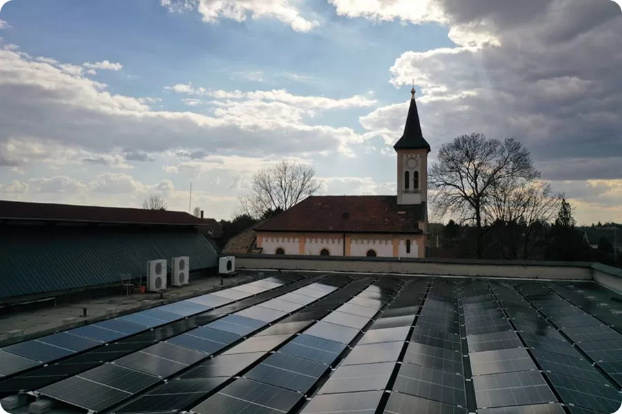 On-site view of a commercial and industrial rooftop solar project in Europe, showing real-world solar panel applications in the local built environment