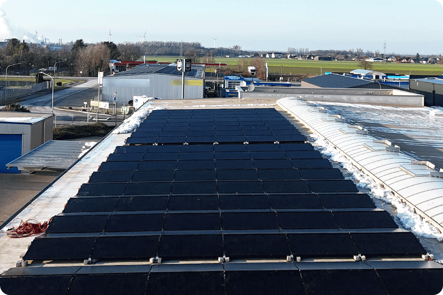 Large commercial and industrial flat rooftop installation with neatly arranged TOPCon solar panels, showing their widespread use in standardised rooftop projects, mature supply capability and suitability for large-scale deployment.