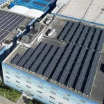 Commercial and industrial rooftop solar project with limited space, showing how skylights and rooftop equipment make layout efficiency per square metre more important